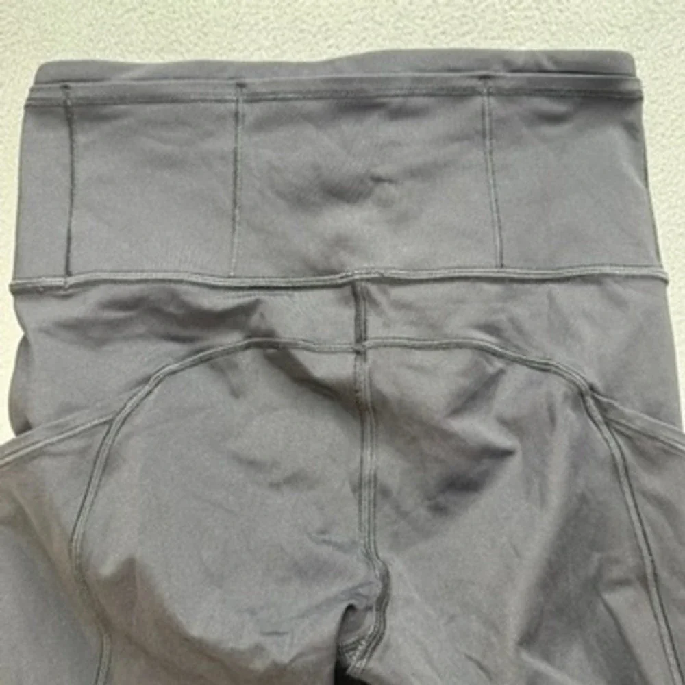 Lululemon Speed Up Crop Leggings 21 Tight‎ Size 2 Black Skull Crossbones Running